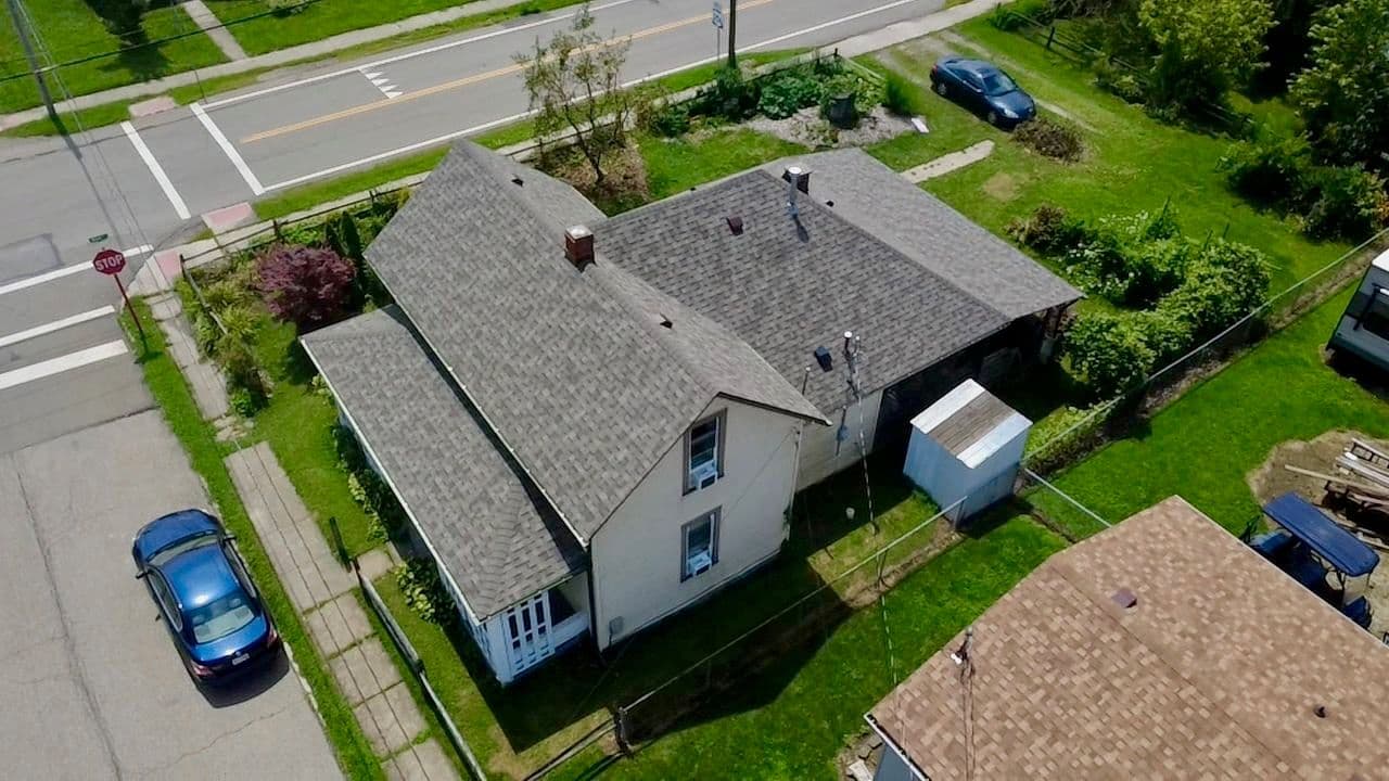 Gallery photos for Stunning Roof Transformation with Durable Shingles: Image #1